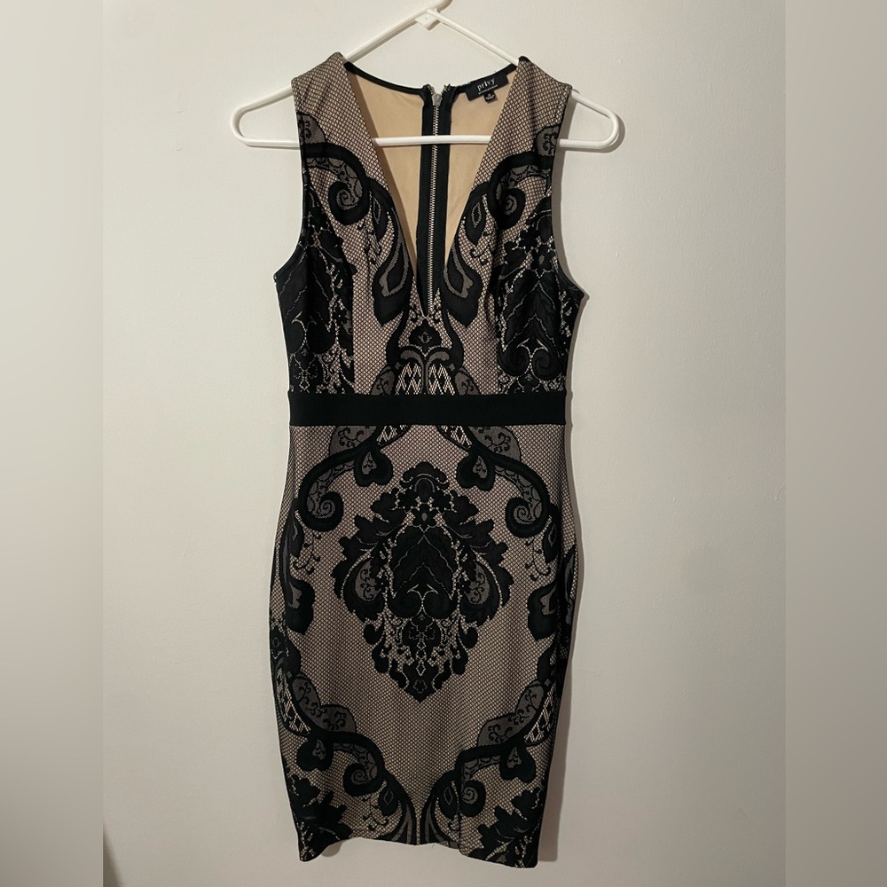 Beige and black lace body con mini dress. Size Medium